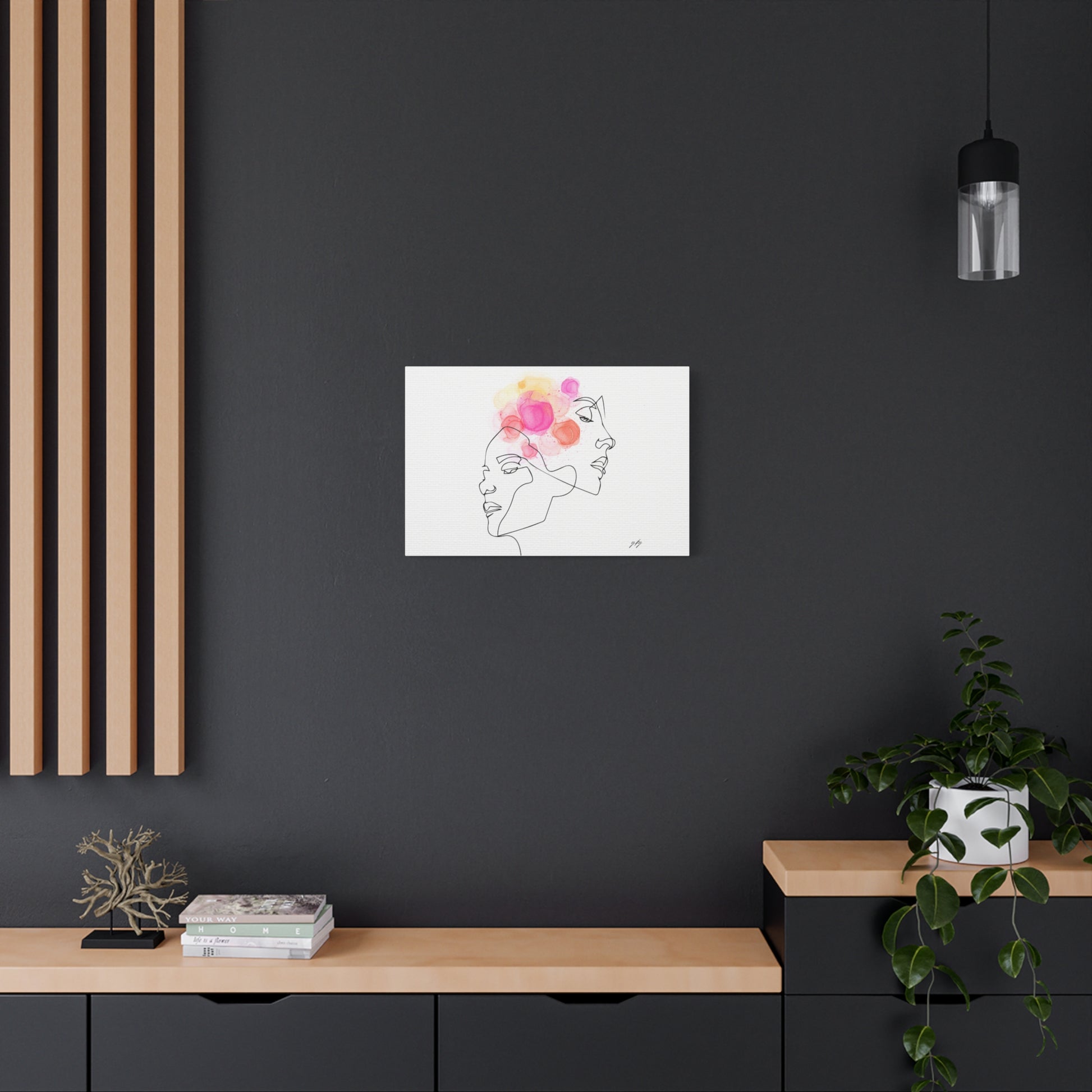 Modern interior with a black wall, wooden shelf, and abstract art print.