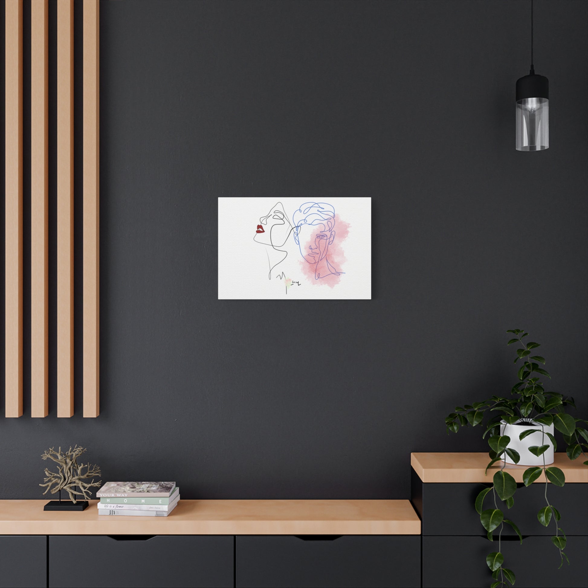 Framed abstract artwork on a dark wall with wooden shelves and decor.