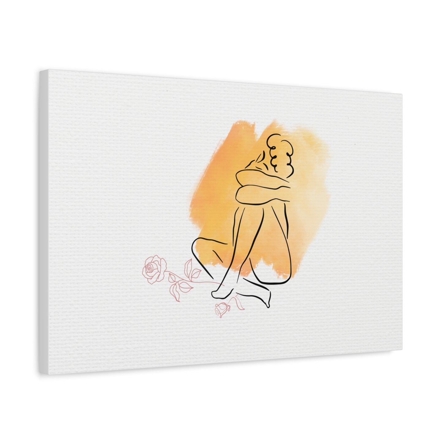 Canvas print with a minimalist line drawing of two people embracing on an orange background, displayed on a white wall.