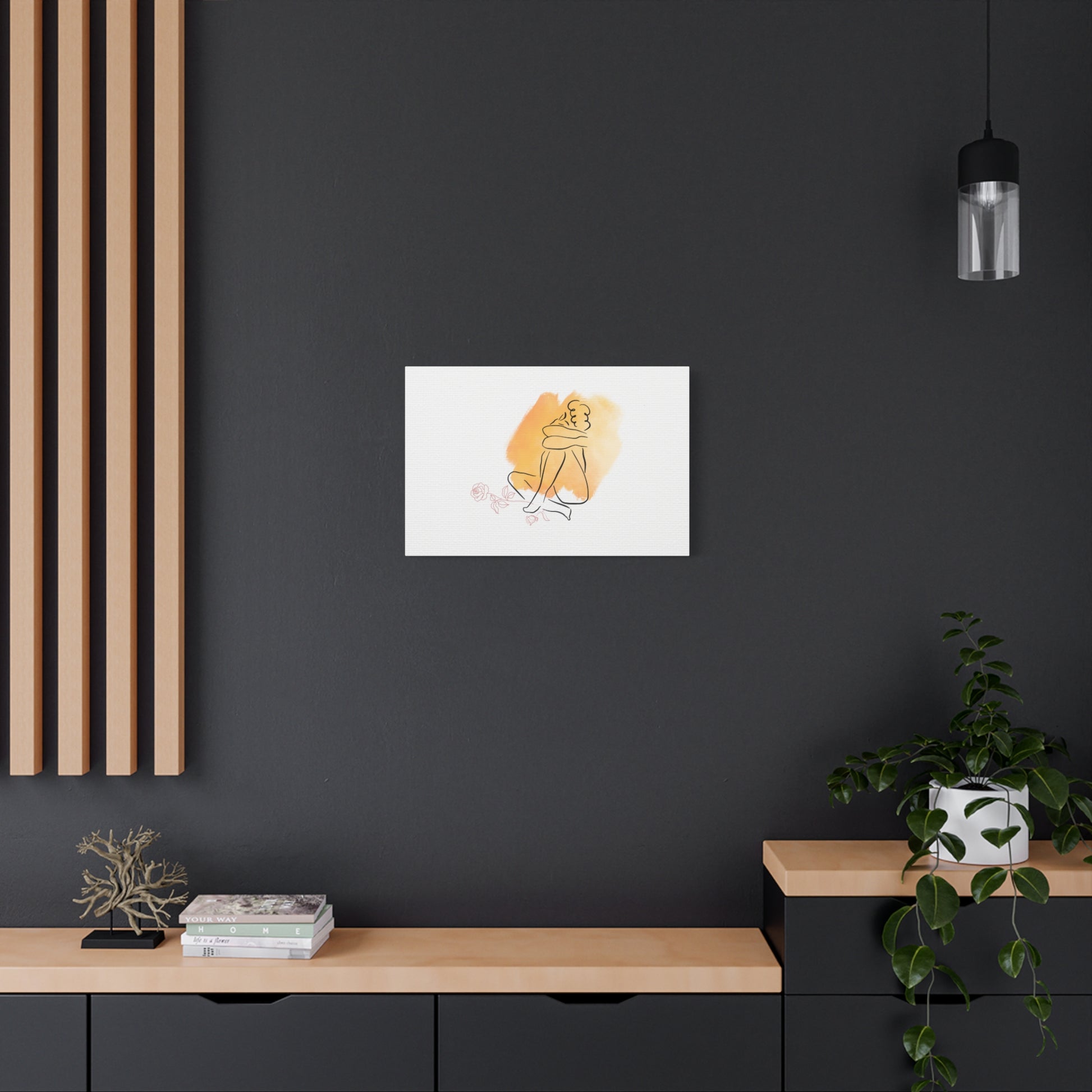 Framed artwork on a dark wall with wooden shelves and plants.